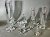 a lot of glass vases that are sitting on a table
