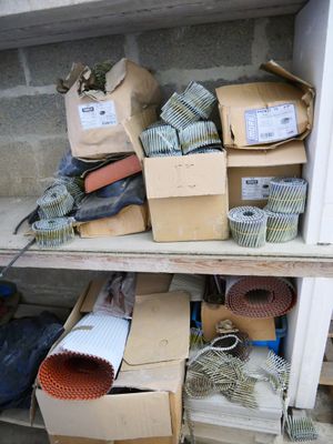 many boxes on the shelves of a building