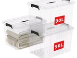 three clear storage boxes with towels and towels in them