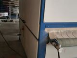 a machine that is sitting inside of a building