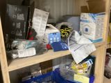 a shelf with many items on it in a room