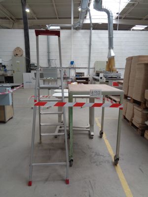 an image of a work area with a table and chairs