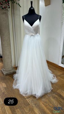 a dress on a mannequin stand in a room