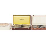 three different types of silverware in a case