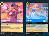 two cards that have a picture of mickey mouse on them