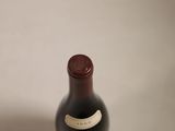 a bottle of wine that is sitting on a table