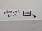 a close up of a label on a refrigerator door