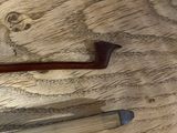 a knife and a pair of scissors on a wooden table