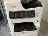 a printer that is sitting on top of a printer