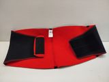 a close up of a red and black belt on a white surface