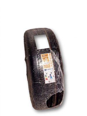a cell phone covered in plastic wrap on a white surface