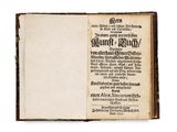 an old book with a black and white title on it