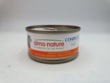 a can of canned cat food on a white surface