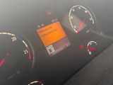 a close up of the dashboard of a car with a speedometer