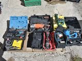 many tools that are sitting on a pallet on the ground