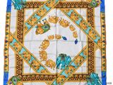 a square scarf with an image of elephants on it