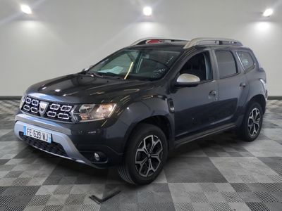 a picture of a black dacia parked on a checkered floor