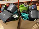 two bins with various items in them on the floor