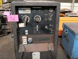 a machine that is sitting on the floor in the garage