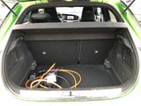 a trunk of a car with a bunch of wires in it