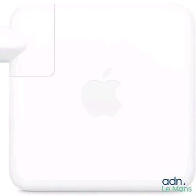 the apple power adapter is plugged into the charger