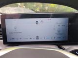 the dashboard of a car with a digital display on it