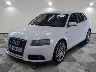 an image of a white audi car in a showroom