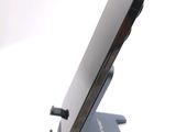 a cell phone that is sitting on top of a stand