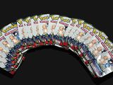 a lot of pokemon cards on a black background