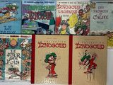 plusieurs livres pour enfants sont alignés sur une surface blanche