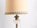 an image of a table lamp with a beige shade on it
