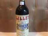 a bottle of wine that is sitting on a table