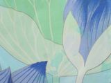 a picture of a close up of a blue and green flower
