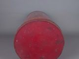 a red object that is sitting on a table