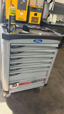 a cart with a bunch of tools on top of it