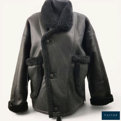 an image of a black leather jacket with a fur collar