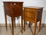 two small tables that are sitting on a tiled floor