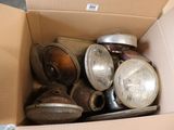 a cardboard box filled with many different types of lights