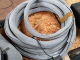 a lot of hoses that are sitting on a pallet
