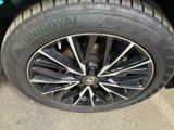 a close up of a tire on a car
