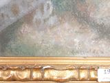 a picture of a painting on the wall with a price tag