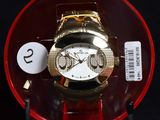 a watch that is sitting in a plastic container