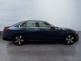 mercedes s - class sedan in a showroom with a sky background