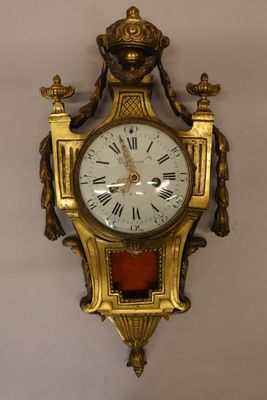 a clock hanging on the wall in a room