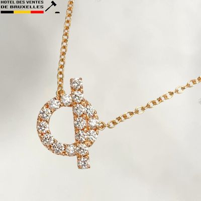 gold plated necklace with a diamond letter d on a gold chain