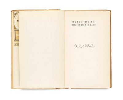 an open book with a handwritten title on it