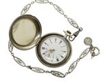 a pocket watch with a chain around it on a white background