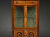 an antique display cabinet with two doors and a glass door
