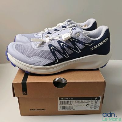 a close up of a pair of shoes on top of a box