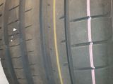 a tire that has a pink strip on the side of it